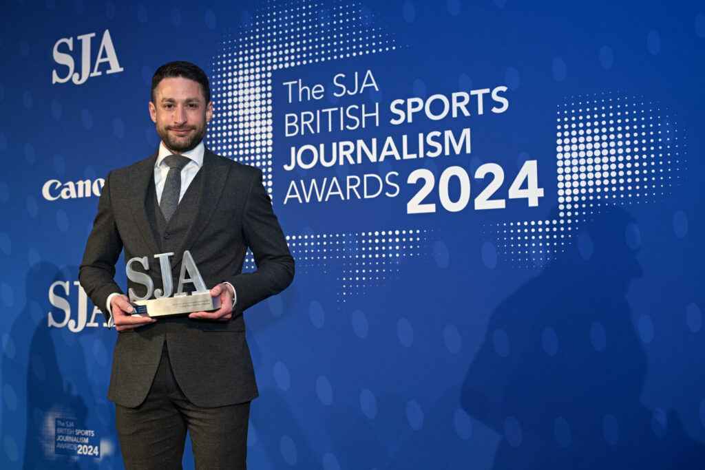 Ornstein holding SJ awards